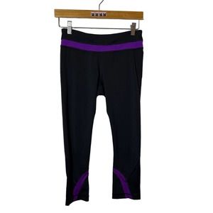 Lululemon Black cropped leggings purple waistband and accents size 6